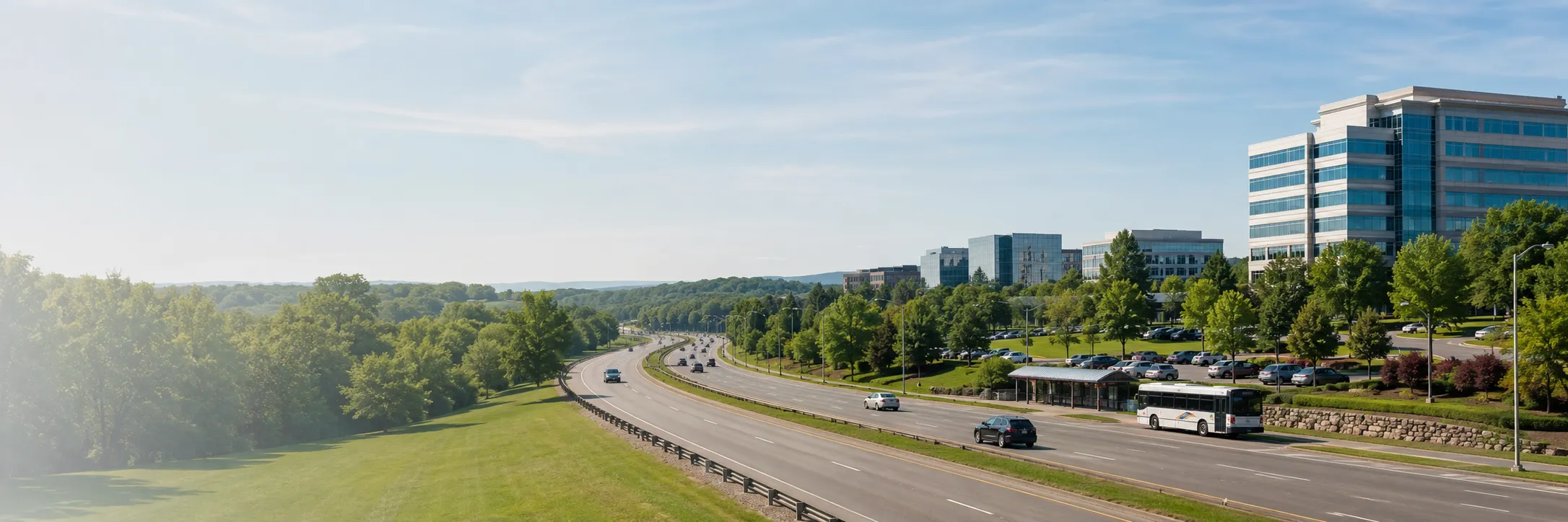 Suburban highway corridor near landscaped corporate office buildings
