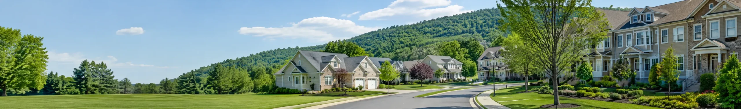Suburban homes and townhouses surrounded by mature landscaping