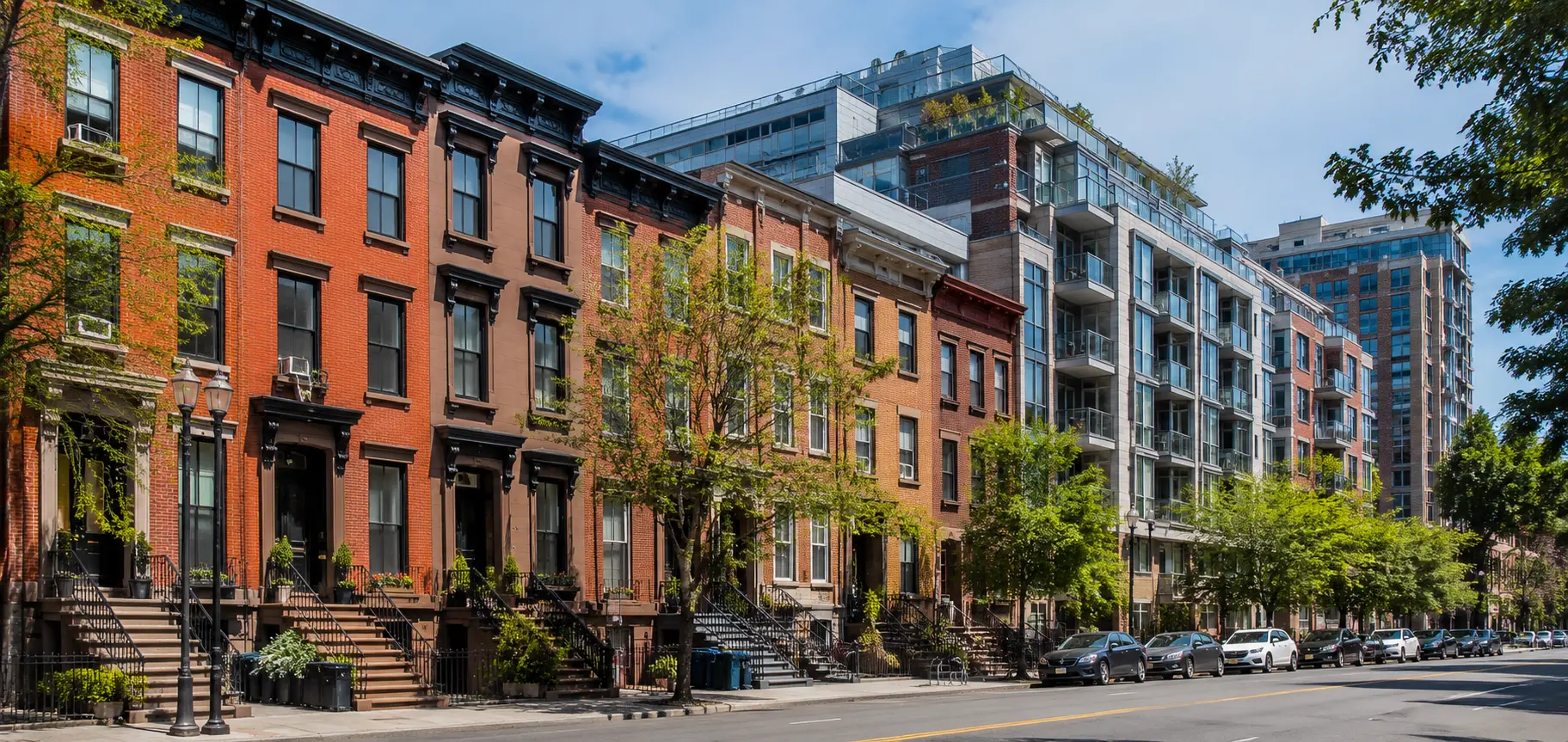 Historic Hoboken brownstones alongside newer condominium buildings